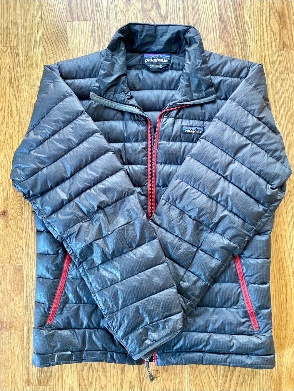 Patagonia Men's Black Puffer Jacket with Red Zippers | Size Small
